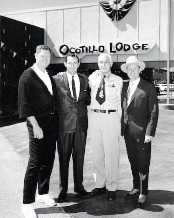 Gene Autry (right) next to George Alexander and two unidentified people.